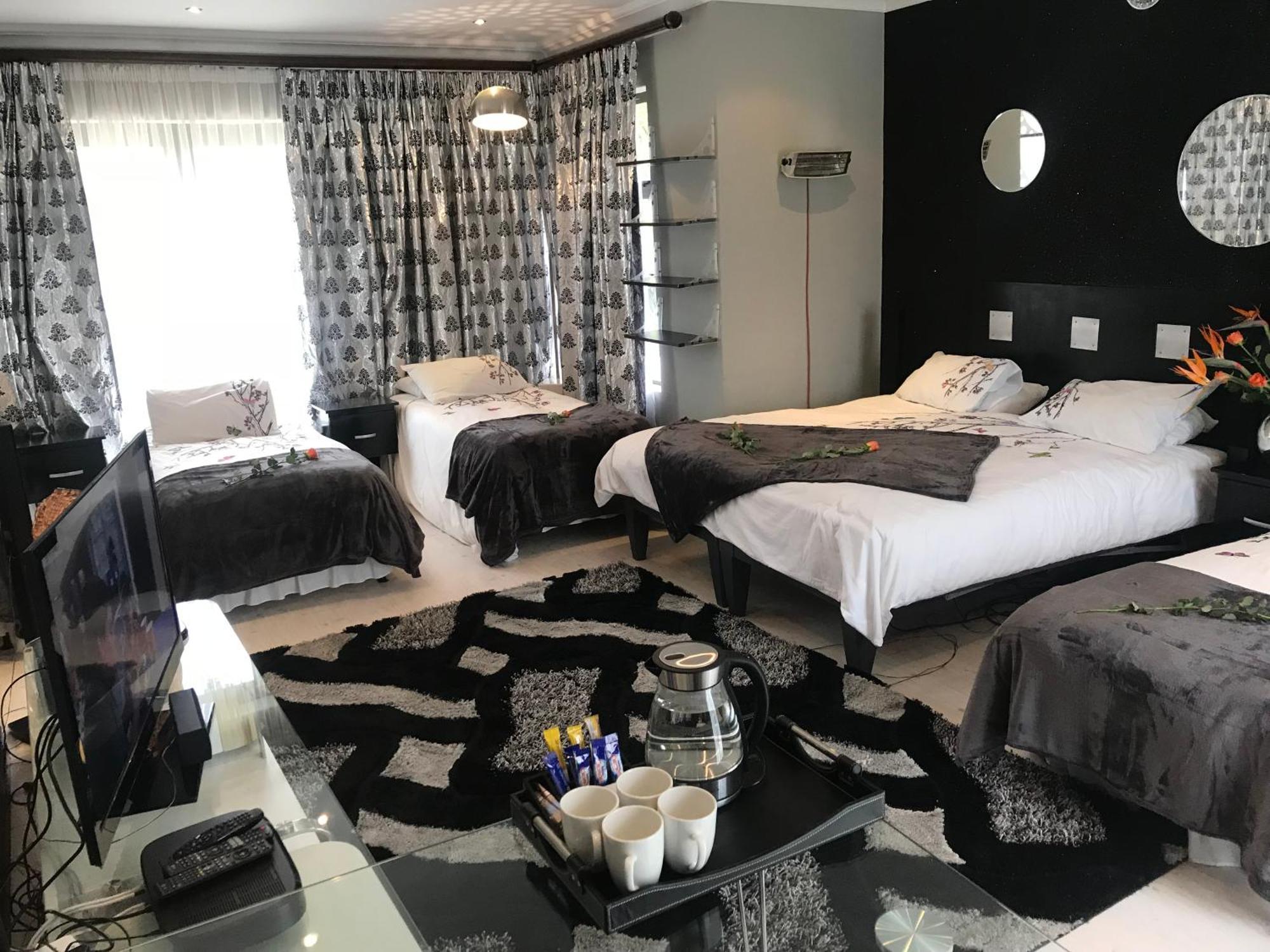 Africa Paradise - Or Tambo Airport Boutique Hotel Benoni Bilik gambar